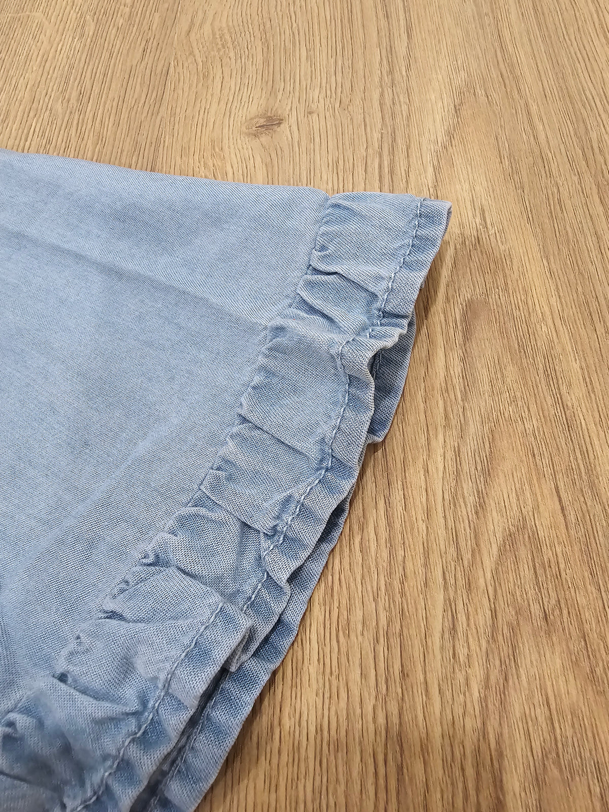 Denim V-neck Mini Ruffle Detail Short Sleeve Shirt